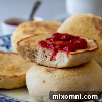 Gluten-Free English Muffin topped with preserves.