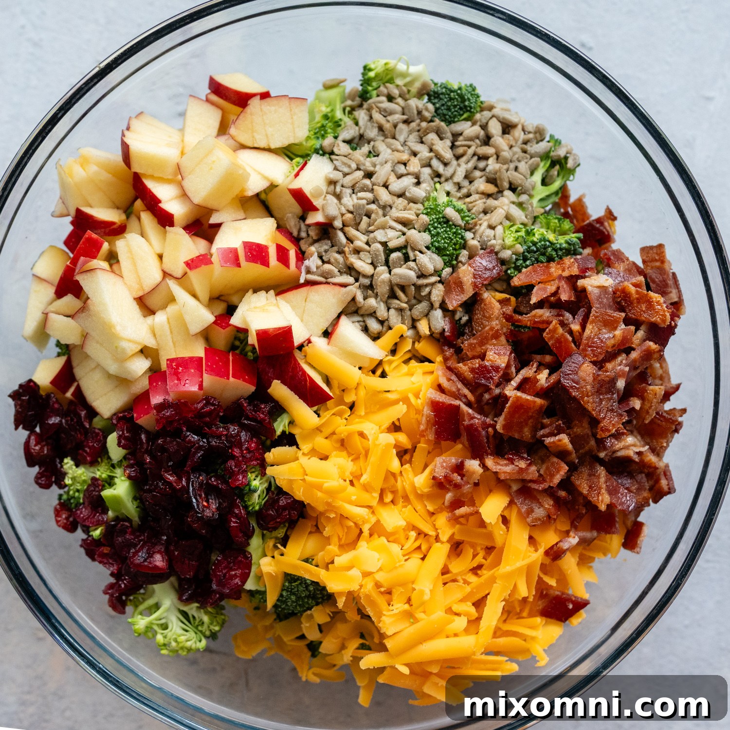Ingredients for the salad in a glass bowl, before dressing.