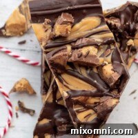 an overhead shot of tiger butter chocolate peanut butter candy stacked up