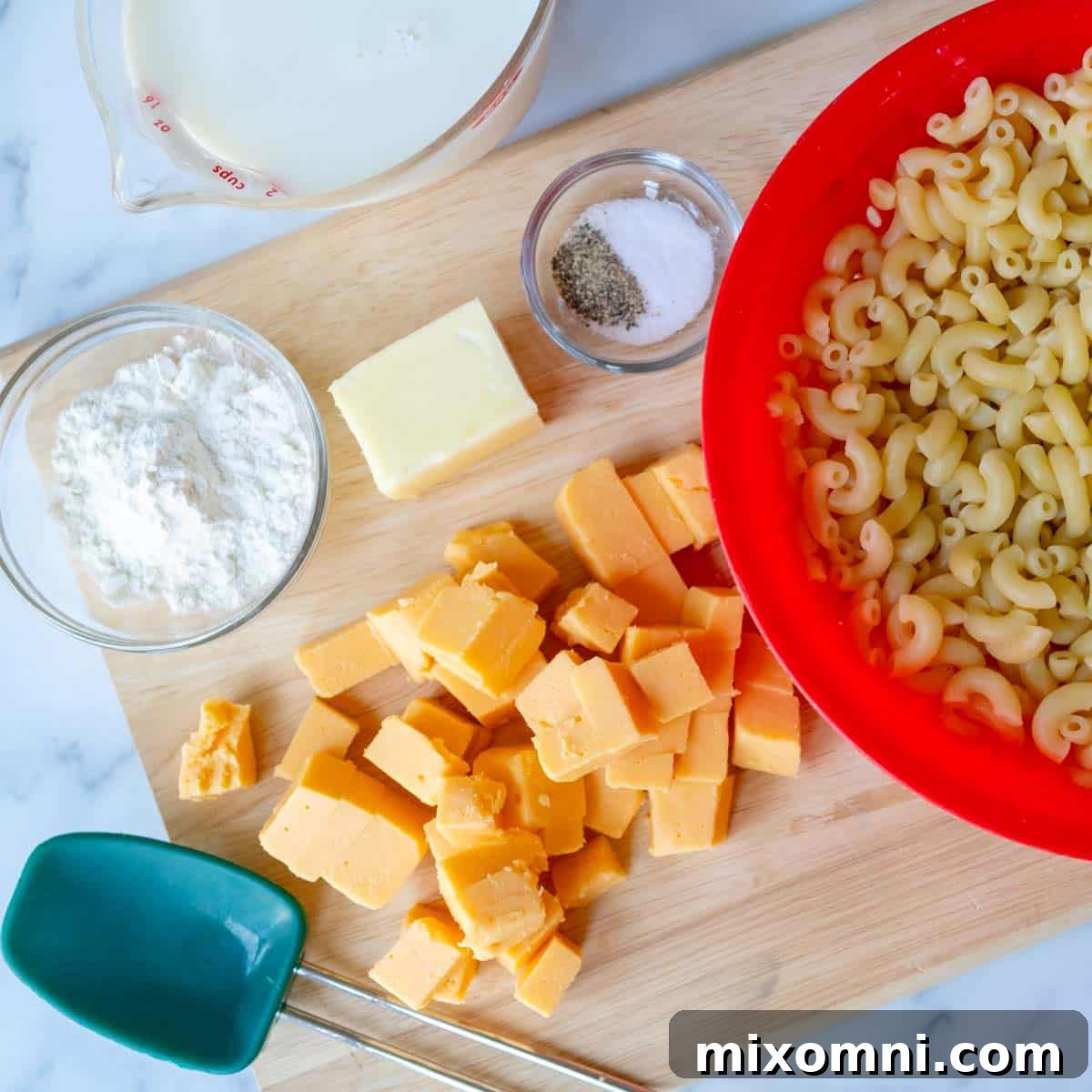 all the ingredients prepped to make baked mac and cheese.