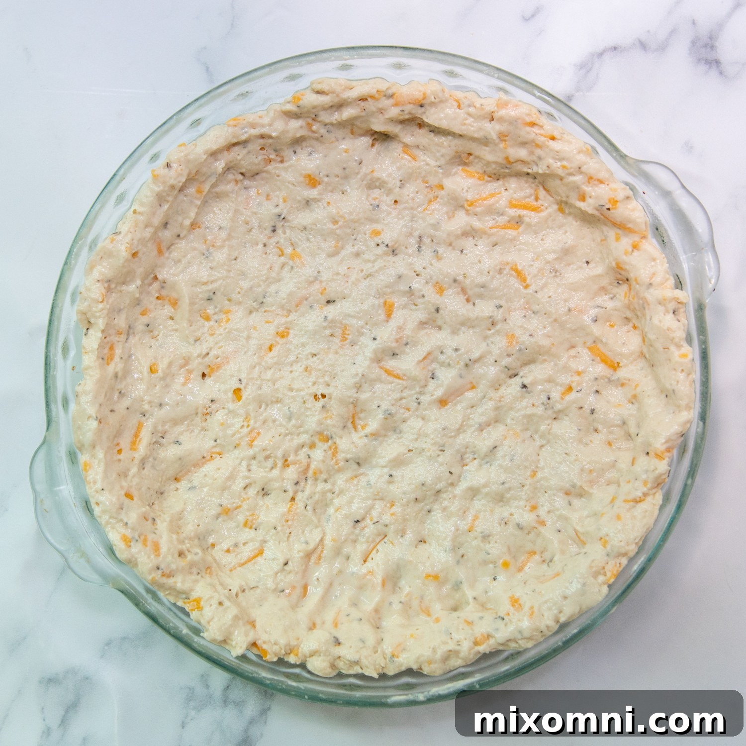 The prepared Bisquick dough pressed into a pie pan, ready for the filling.
