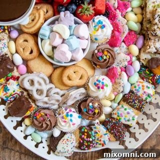 A close up on how the cookies and sweets are arranged on the dessert platter