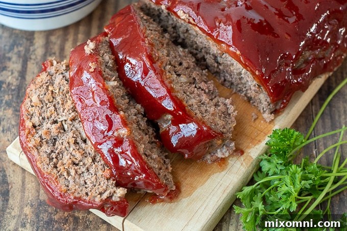 overhead shot of instant pot meatloaf on a wooden cutting board