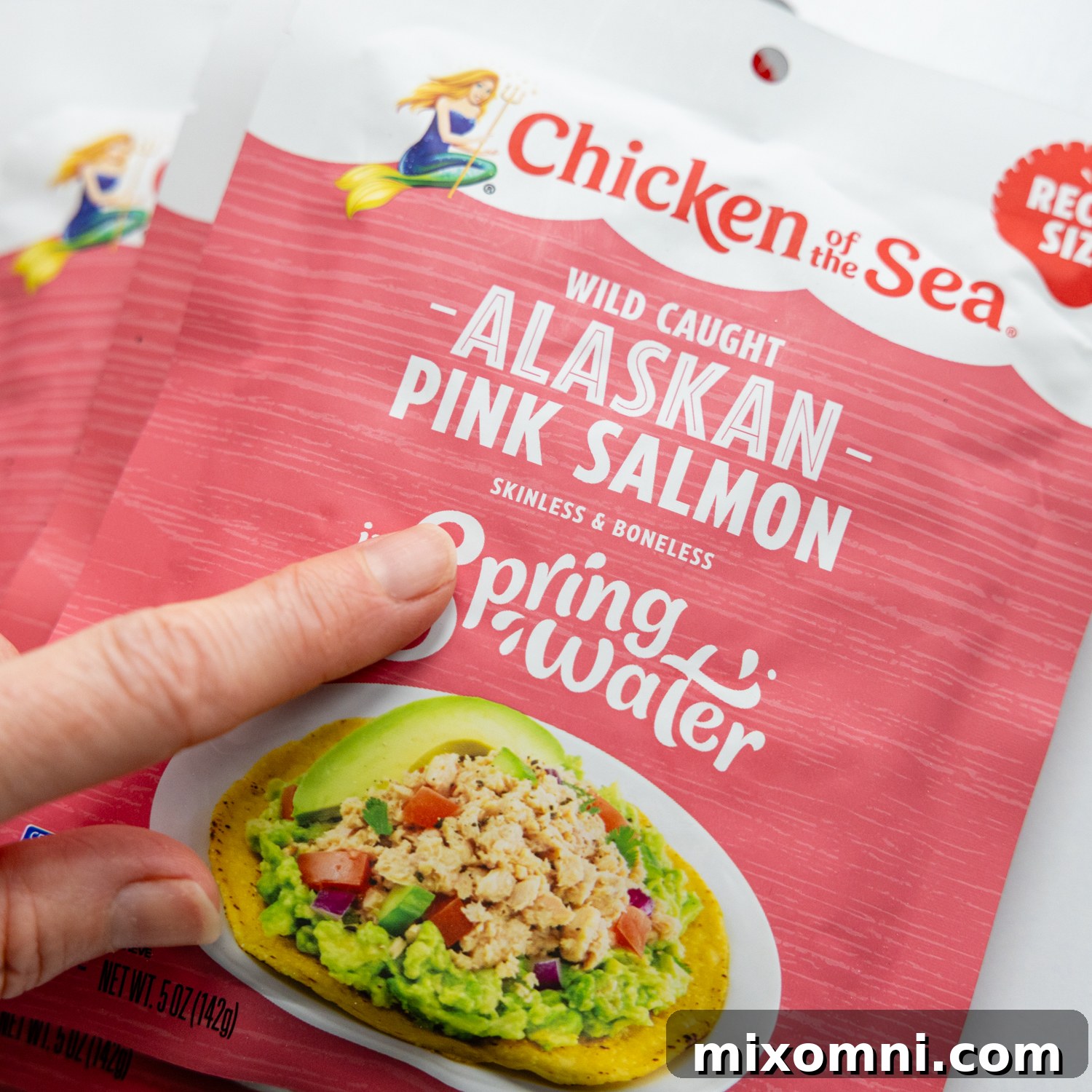 Package of Alaskan pink salmon being prepared.